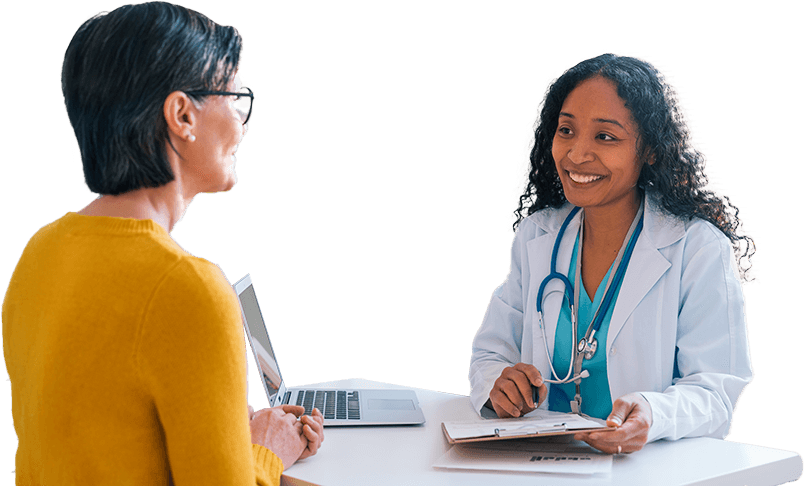 A female doctor smiling at a patient